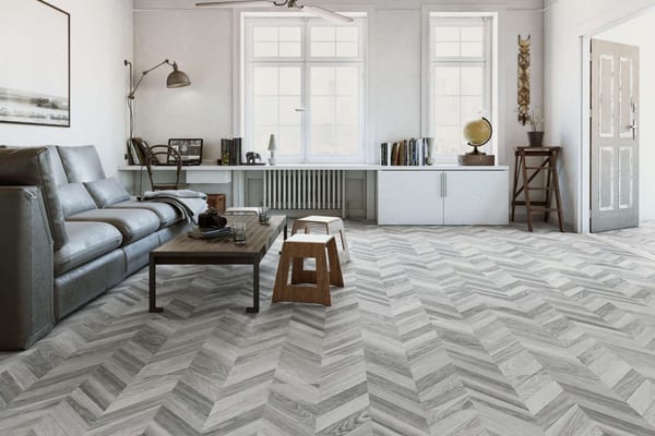 Chevron pattern flooring in an elegant dining room