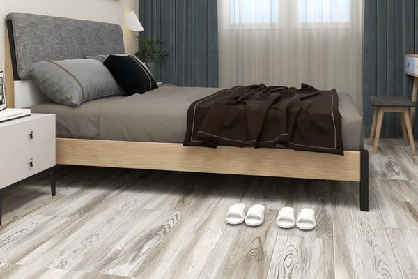 Loose lay vinyl plank flooring in a master bedroom