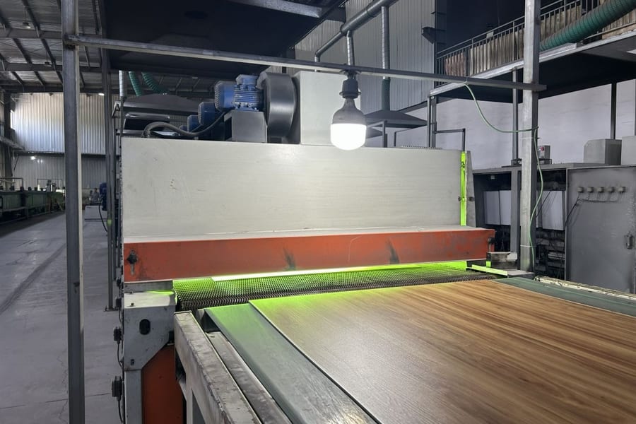Embossing rollers applying surface texture